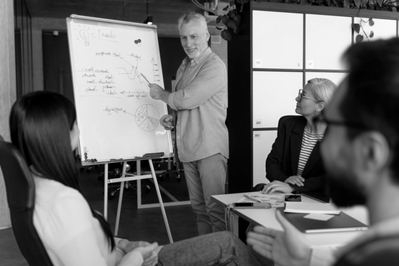 Strategic business meeting discussing financial performance metrics