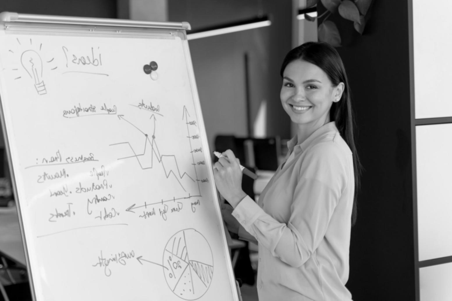 Business owner analyzing financial reports and performance metrics