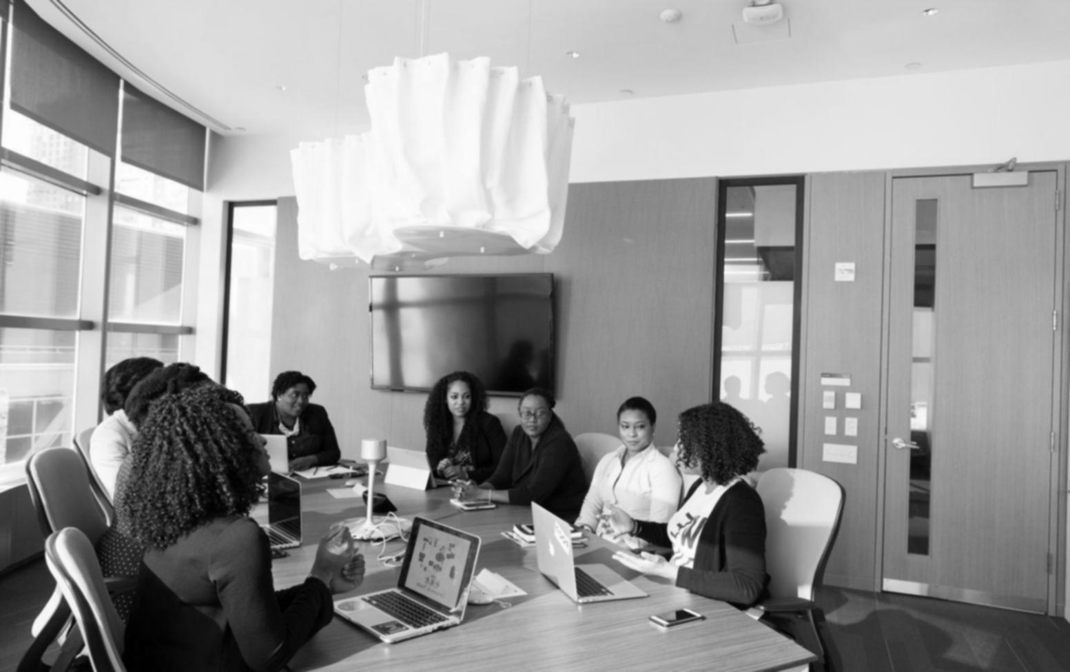 Financial analysis workshop session with participants reviewing business cases