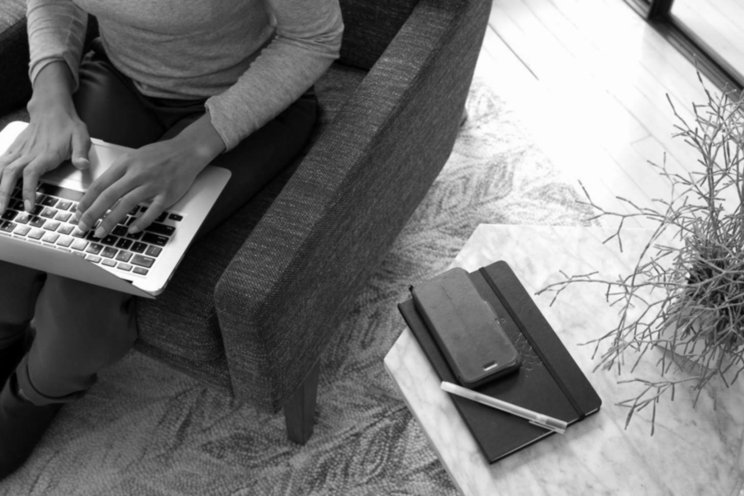 Business professional reviewing financial documents in modern office